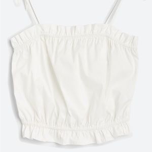 Never been worn cropped Cami 97% cotton, 3% spandex.